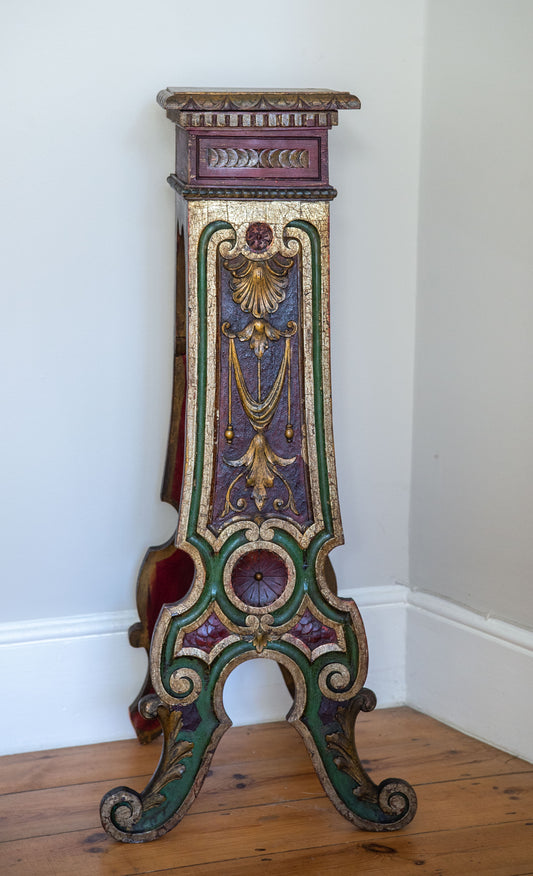 A 19th Century continental polychrome pine jardiniere stand