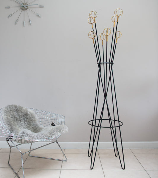 A Large Contemporary Atomic Hairpin Coat Stand With Gilt Spherical Finials.