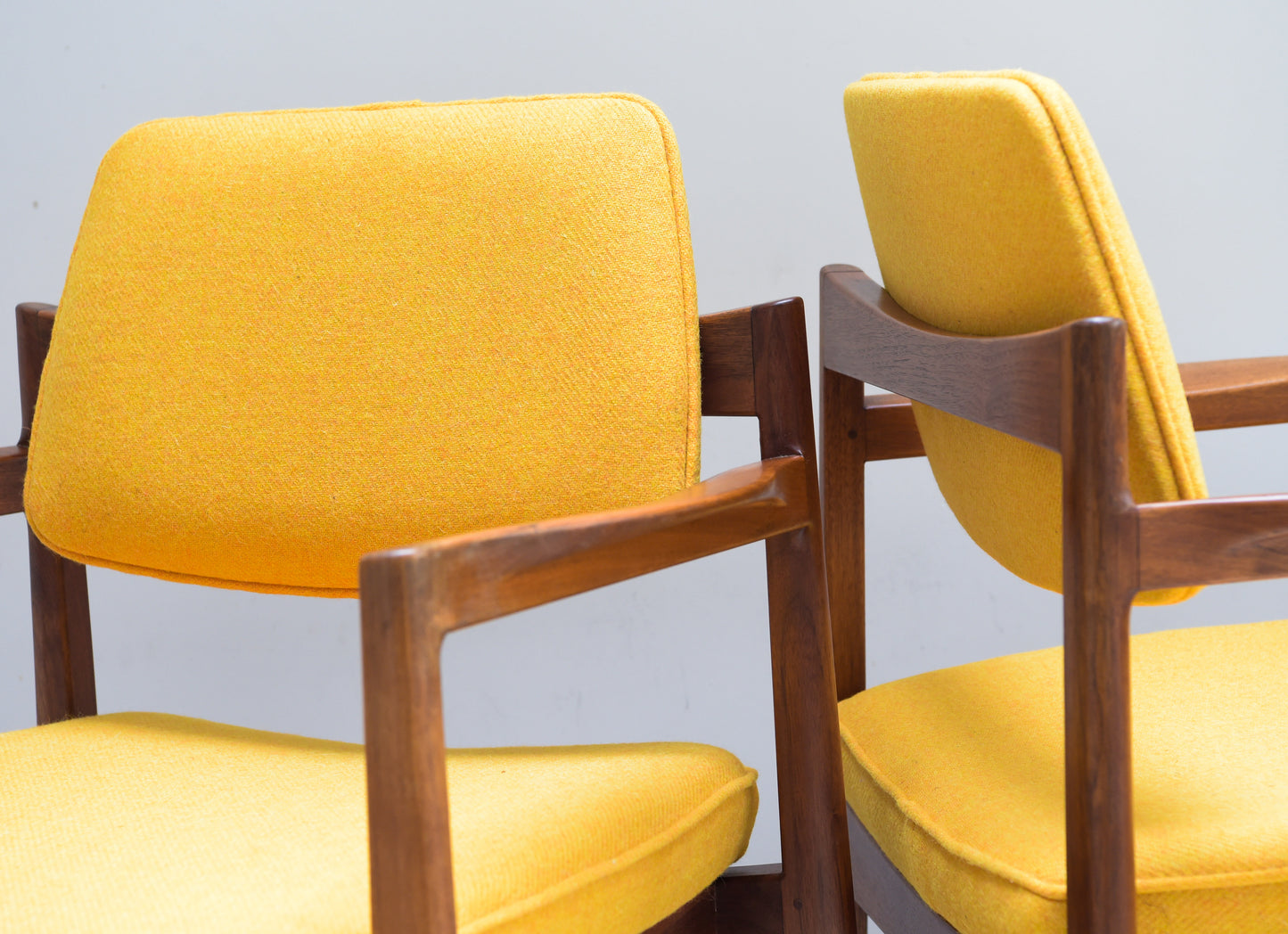 Two Arm Chairs By Jens Risom In Walnut Re Upholstered In Harris Tweed Circa 1968.